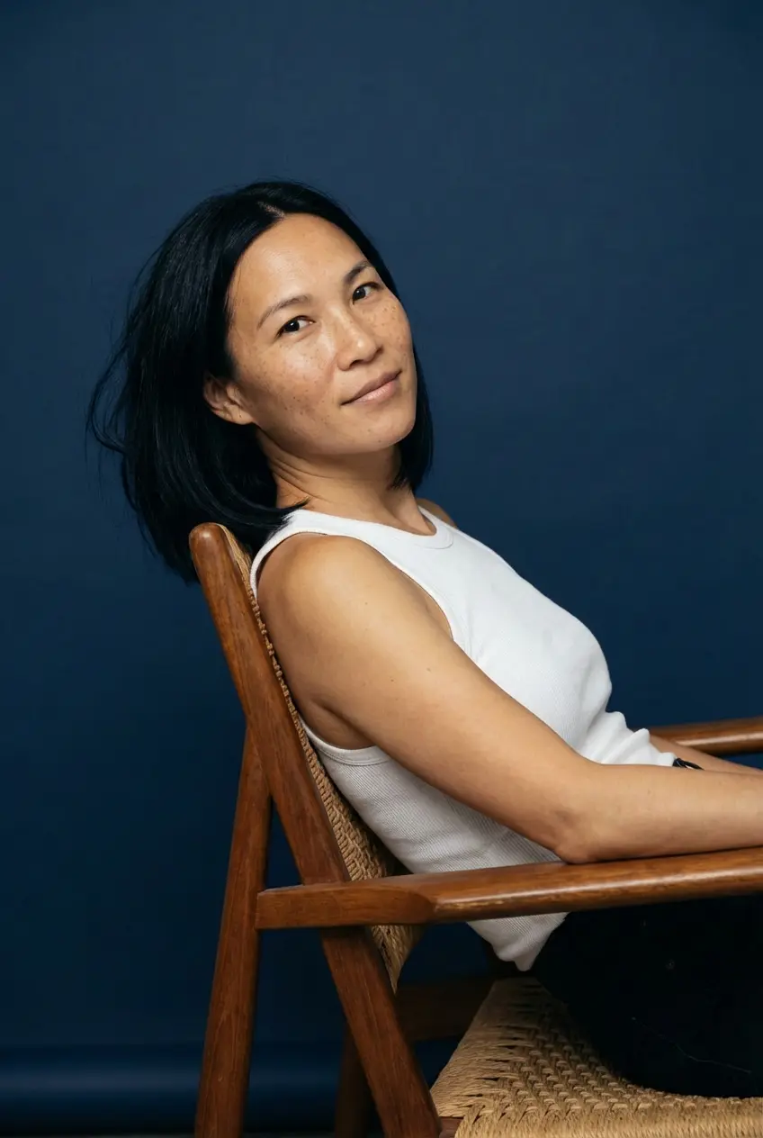 Woman studio headshot in neutral tones