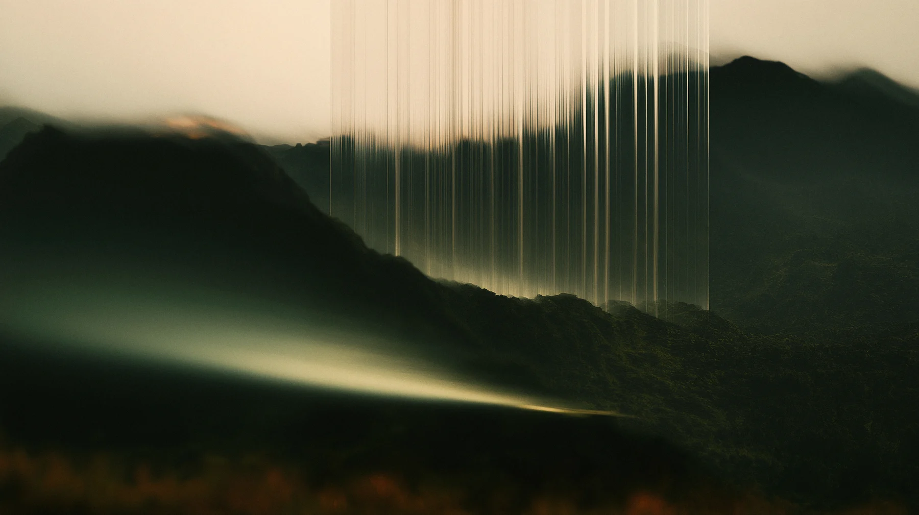 Mountain ridges through vertical light